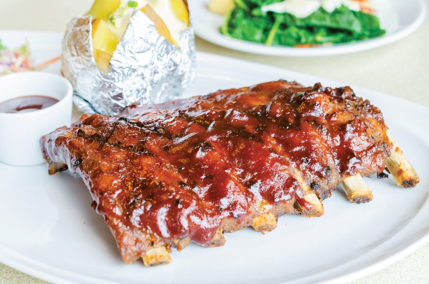 1/2 rack of Baby Back Ribs in BBQ sauce